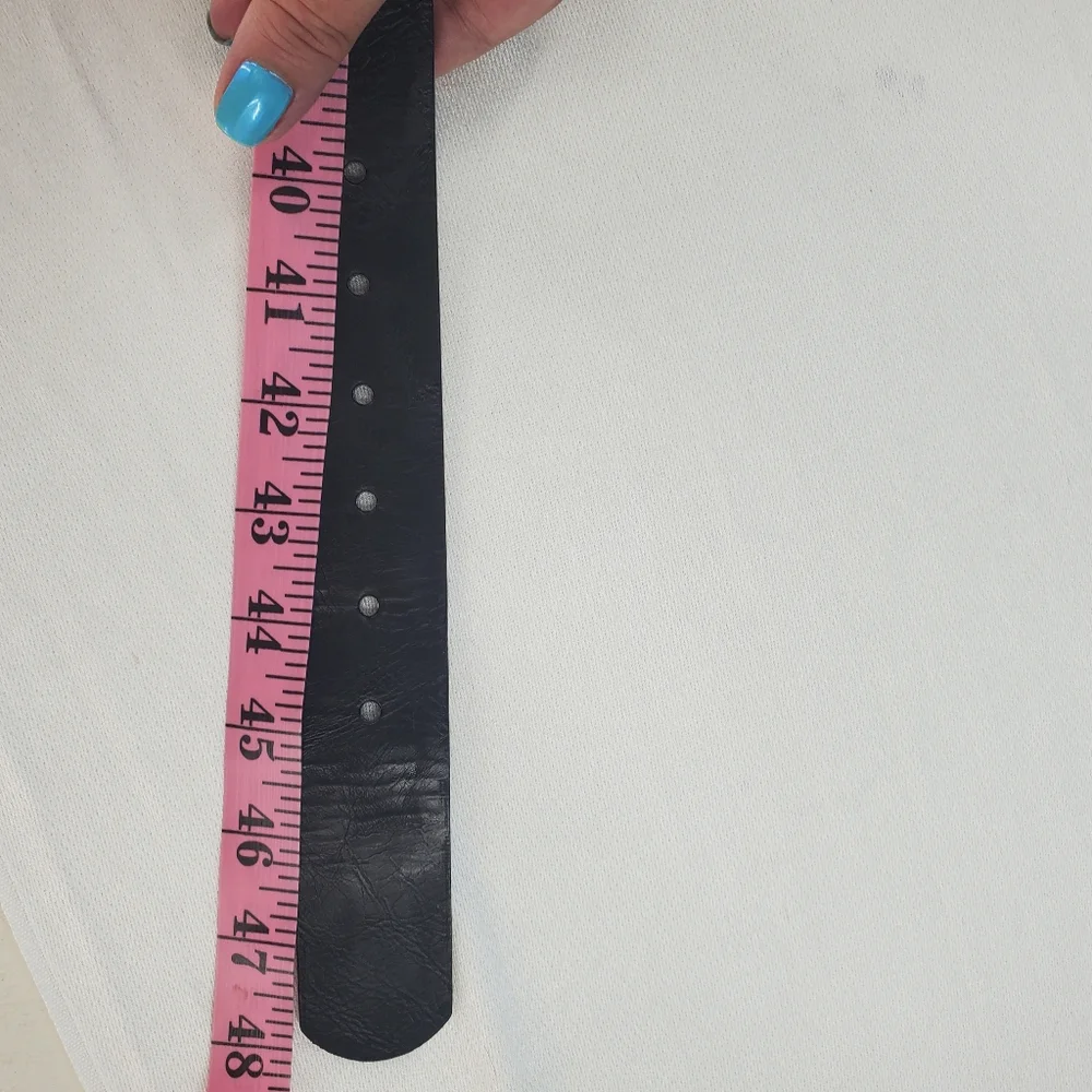 Black leather belt silver tone buckle